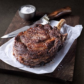 Fogo de Chão Brazilian Steakhouse signature dishes Picanha (prime part of the top sirloin), Filet Mignon, Ribeye, Lamb Chops, extensive Market Table selections, Pão de Queijo (cheese bread).
